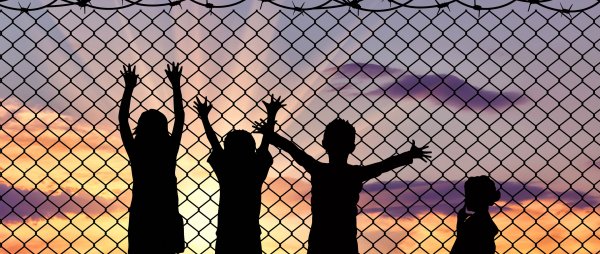 Children at a border gate