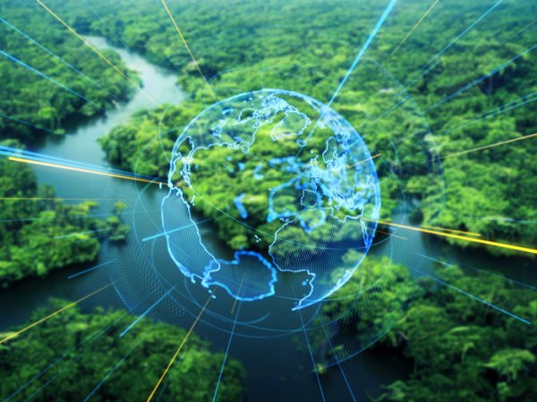 Photo illustration of tech graphics overlaid on a lush green landscape