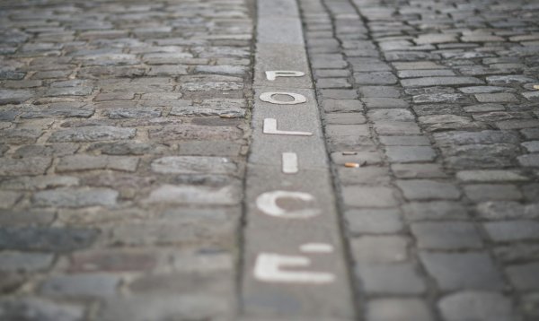 The word "police" on a brick pathway