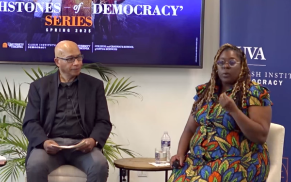Two speakers seated at Touchstones of Democracy event