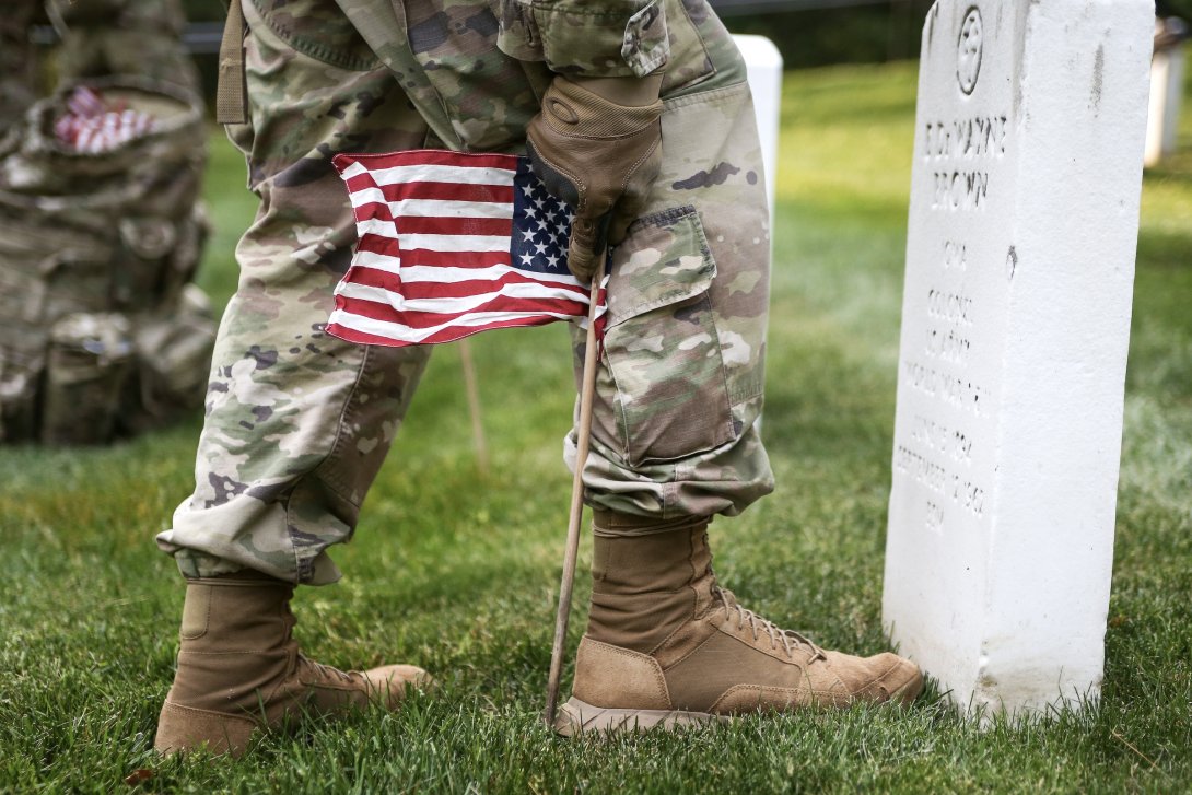 Soldier at gravesite