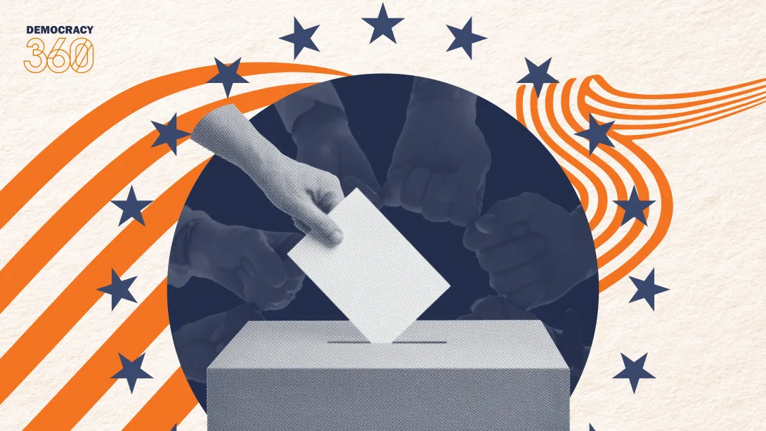 A hand places a ballot into a ballot box in front of a background of more hands to signify the importance of communal connection to sustain democracy.