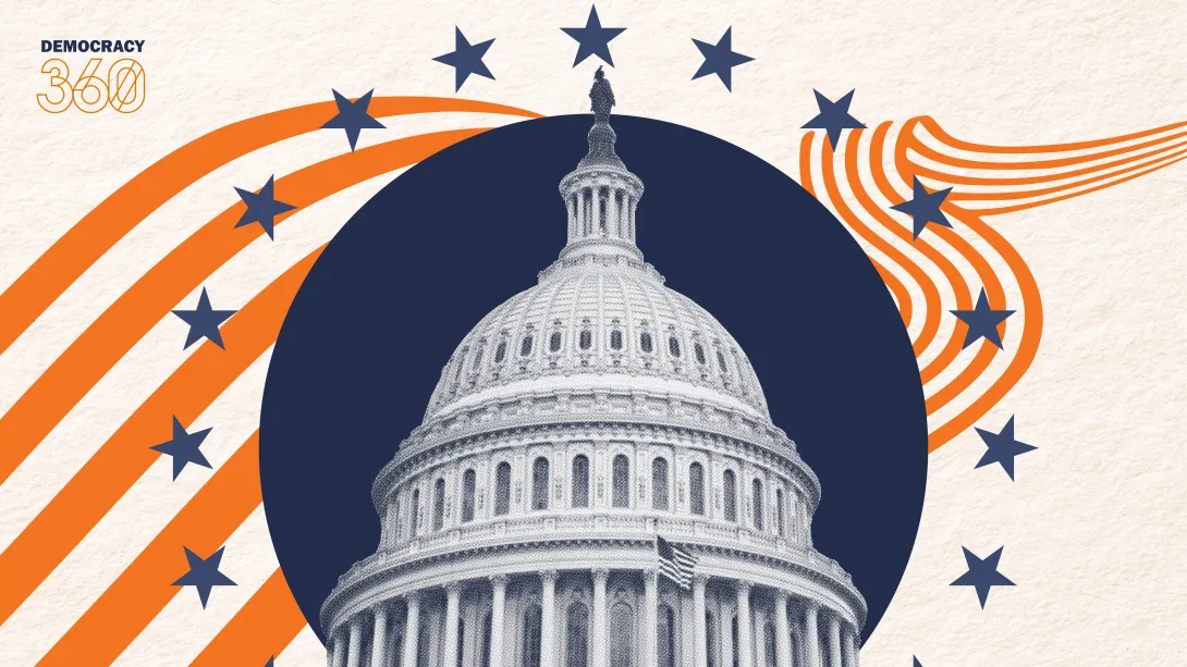 The United States Capitol dome stands proudly amongst a ring of stars.
